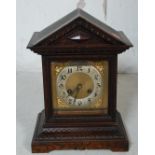 EDWARDIAN OAK MANTEL CLOCK OF ARCHITECTURAL FORM