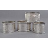 SET OF FOUR JOHN ROSE SILVER NUMBERED NAPKIN RINGS