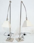 PAIR OF CONTEMPORARY CHROME LAMPS