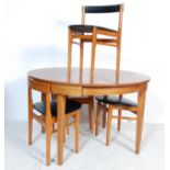 RETRO VINTAGE ROUNDETTE DINING TABLE AND CHAIRS IN THE MANNER OF FREM ROJLE