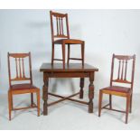 MID 20TH CENTURY OAK DRAW LEAF DINING TABLE AND CHAIRS