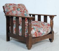 CIRCA 1930’S OAK FIRESIDE ARMCHAIR