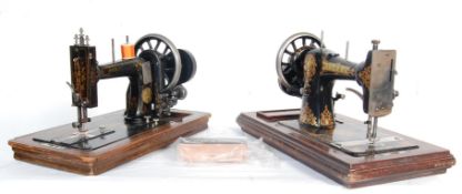 TWO HIGHLY DECORATIVE ANTIQUE EARLY 20TH CENTURY SEWING MACHINES