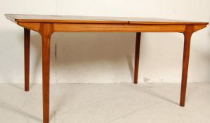 TEAK WOOD EXTENDING DINING TABLE BY MCINTOSH