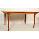 TEAK WOOD EXTENDING DINING TABLE BY MCINTOSH