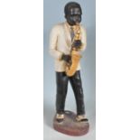 TWO LARGE CERAMIC FIGURINES OF A JAZZ BAND PLAYERS