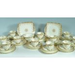 11 PERSON TEA SET BY TUSCAN CHINA IN PLANT PATTERN