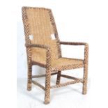 20TH CENTURY WICKER ARMCHAIR IN THE MANNER FRANCO ALBINO
