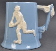 DARTMOUTH POTTERY BLUE AND WHITE CRICKET MUG