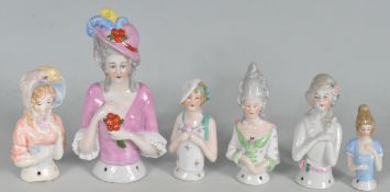 COLLECTION OF PORCELAIN PIN CUSHION HALF DOLLS