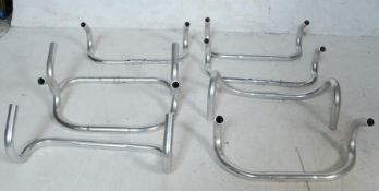 COLLECTION OF EIGHT VINTAGE BICYCLE HANDLEBARS