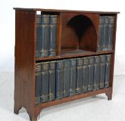 COMPLETE COLLECTION OF EIGHTEEN CHARLES DICKENS HARDBACK BOOKS WITHIN AN OAK BOOKCASE