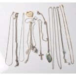 COLLECTION OF STAMPED 925 SILVER NECKLACES AND PENDANTS.