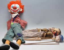 THREE 20TH CENTURY THAI PUPPETS AND A CLOWN