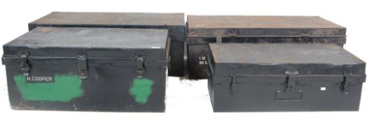 FOUR VINTAGE METAL STORAGE TRUNKS