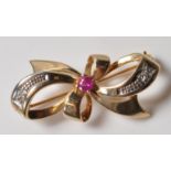 9CT GOLD PINK STONE AND DIAMOND BROOCH