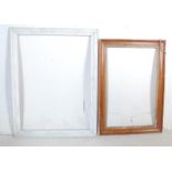 TWO ANTIQUE AND LATER WOODEN PICTURE FRAMES