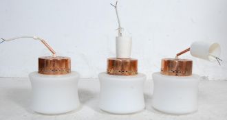 FOUR VINTAGE RETRO GLASS AND COPPER CEILING LIGHTS