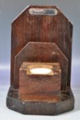 EARLY 20TH CENTURY TEAK HMS SPARTIATE COMMODE INKWELL