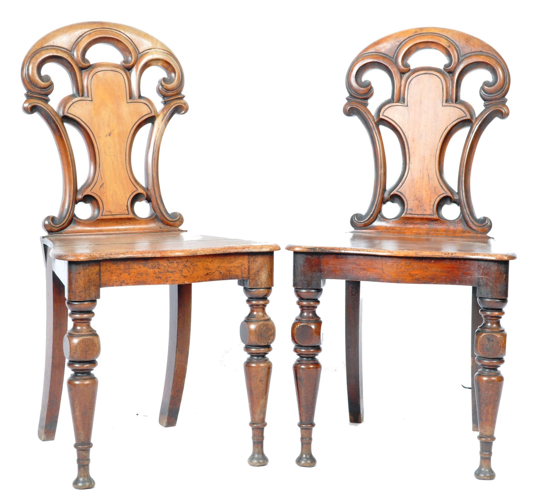 MATCHING PAIR OF VICTORIAN MAHOGANY CARVED HALL CHAIRS