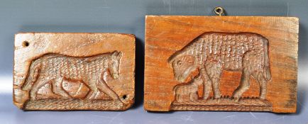 TWO ANTIQUE CARVED WOOD BUTTER MOULDS