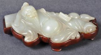 ANTIQUE CHINESE PALE CELADON RECLINED POET FIGURINE