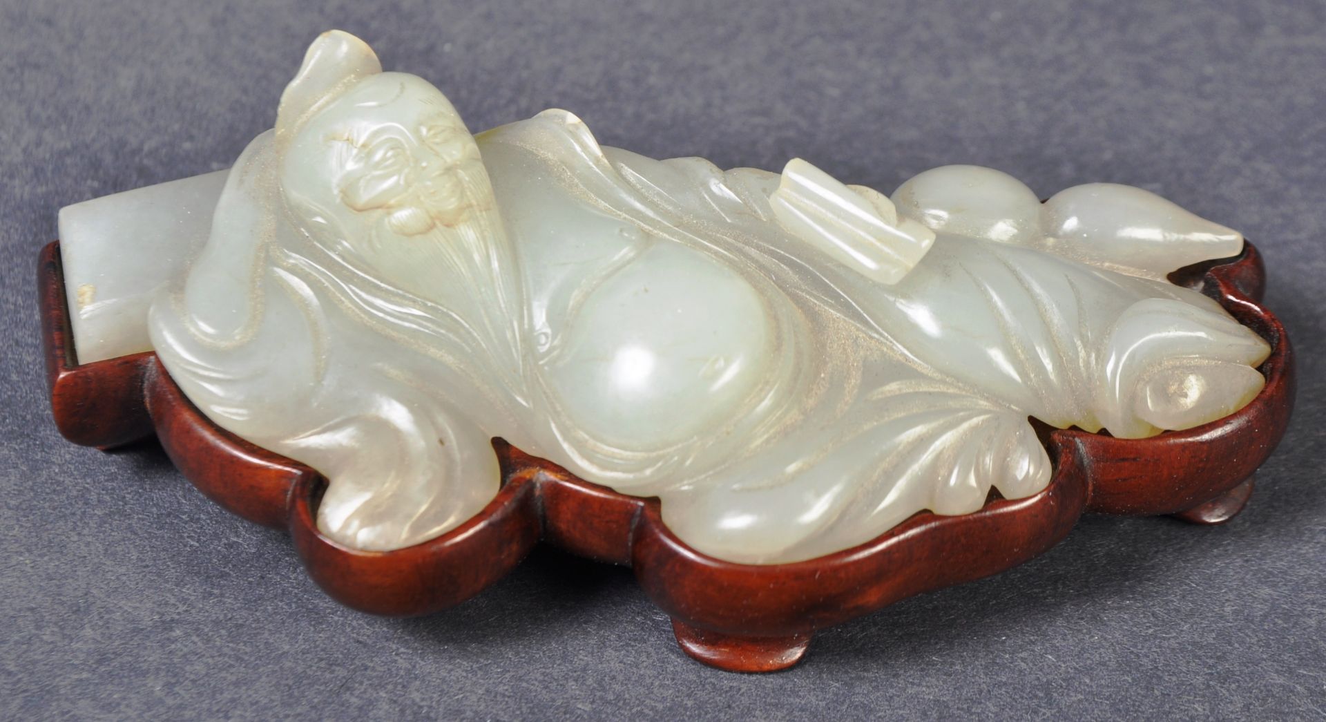 ANTIQUE CHINESE PALE CELADON RECLINED POET FIGURINE
