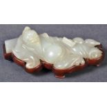 ANTIQUE CHINESE PALE CELADON RECLINED POET FIGURINE