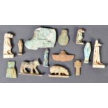 COLLECTION OF EGYPTIAN AMULETIC ARTIFACTS AND FIGURES