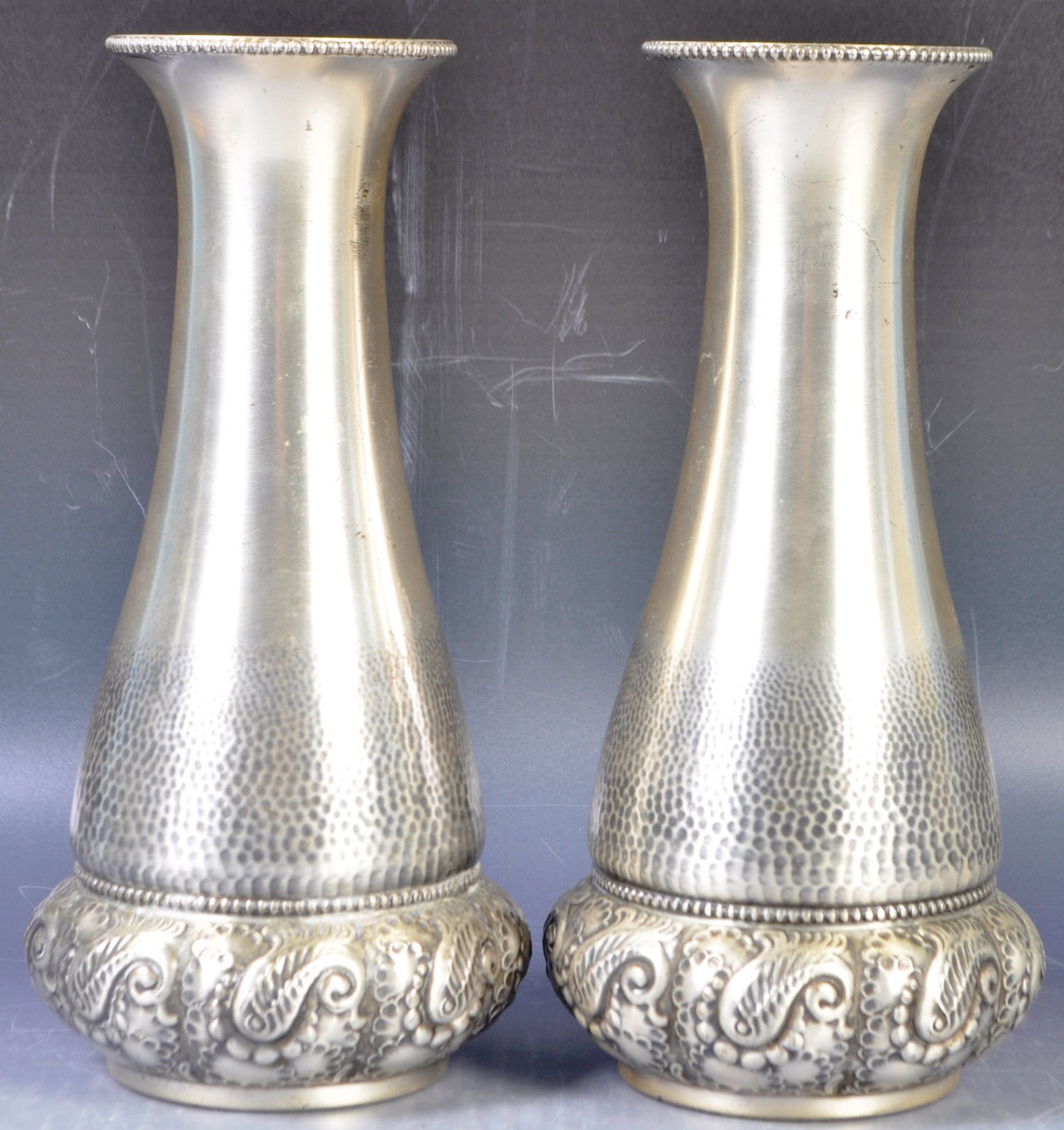 PAIR OF EARLY 20TH CENTURY WMF REPOUSSE DECORATED VASES