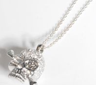 STAMPED 925 SILVER SKULL AND CROSS BONES PENDANT NECKLACE.