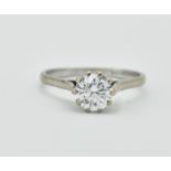 18CT WHITE GOLD AND DIAMOND SOLITAIRE RING