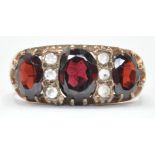 9CT GOLD GARNET & WHITE STONE RING