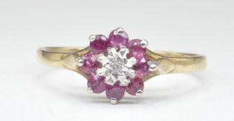 9CT GOLD DIAMOND AND PINK STONE CLUSTER RING