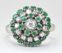 WHITE GOLD DIAMOND AND EMERALD CLUSTER RING