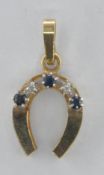 9CT GOLD SAPPHIRE AND DIAMOND HORSESHOE PENDANT