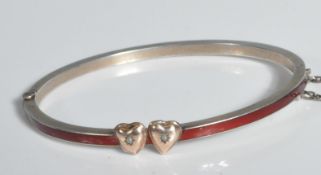 ANTIQUE SILVER ENAMEL AND PEARL BANGLE BRACELET