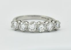 HALLMARKED PLATINUM AND DIAMOND FIVE STONE RING