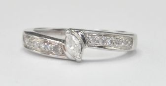 WHITE GOLD AND DIAMOND CROSSOVER RING