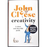 JOHN CLEESE - FAWLTY TOWERS - AUTOGRAPHED CREATIVITY BOOK