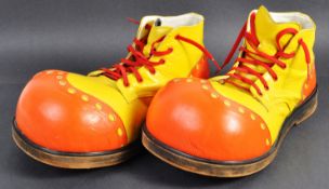 PAIR OF VINTAGE 20TH CENTURY ORANGE & YELLOW CLOWN SHOES