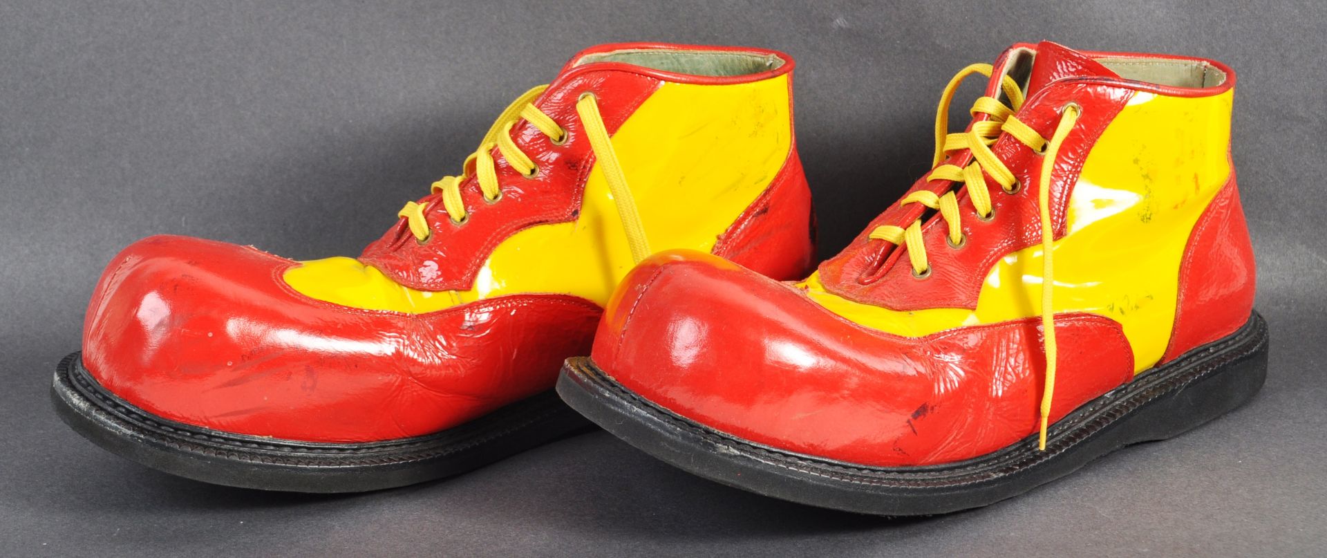PAIR OF VINTAGE RED & YELLOW CLOWN SHOES