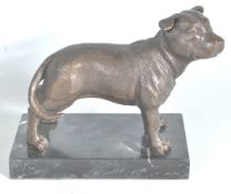 20TH CENTURY CAST BRONSE FIGURE OF A STAFFORDSHIRE TERRIER DOG.