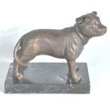 20TH CENTURY CAST BRONSE FIGURE OF A STAFFORDSHIRE TERRIER DOG.