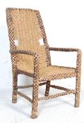 20TH CENTURY WICKER ARMCHAIR IN THE MANNER FRANCO ALBINO