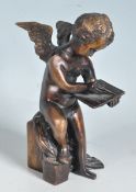 ANTIQUE STYLE BRASS / BRONZE CUPID FIGURINE