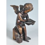 ANTIQUE STYLE BRASS / BRONZE CUPID FIGURINE