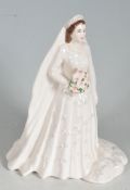 21ST CENTURY ROYAL WORCESTER PORCELAIN FIGURINE