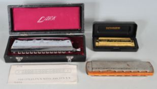 THREE VINTAGE HARMONICA MUSICAL INSTRUMENTS