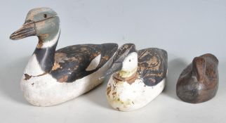 THREE WOODEN DUCK FIGURINES